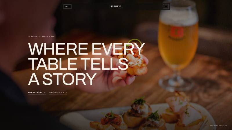 The Esturya home page, showing the bar at night above the name